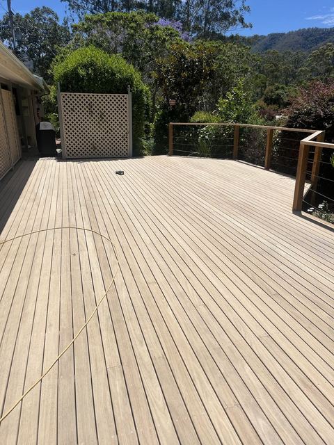 New hardwood deck boards fixed down on a deck