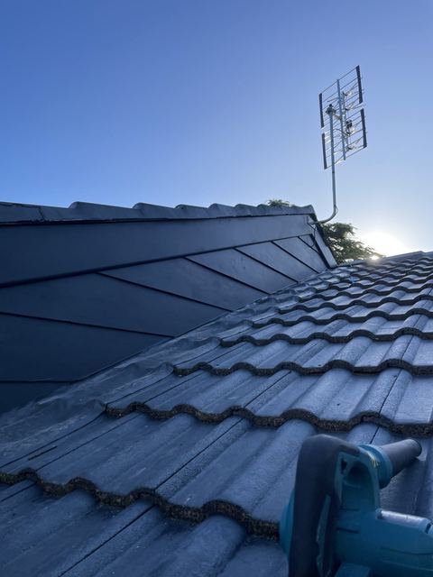 Ridge capping and flashing on a tiled roof