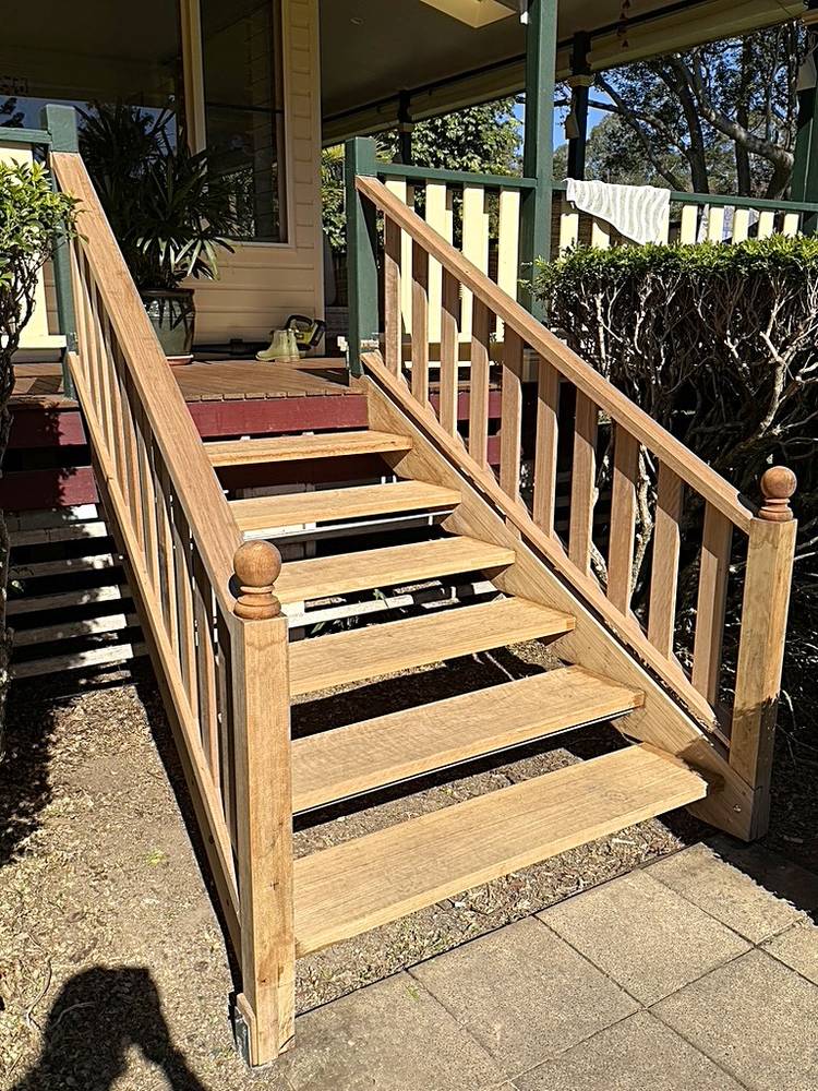 Splayed timber stairs with a timber balustrade in Nana Glen