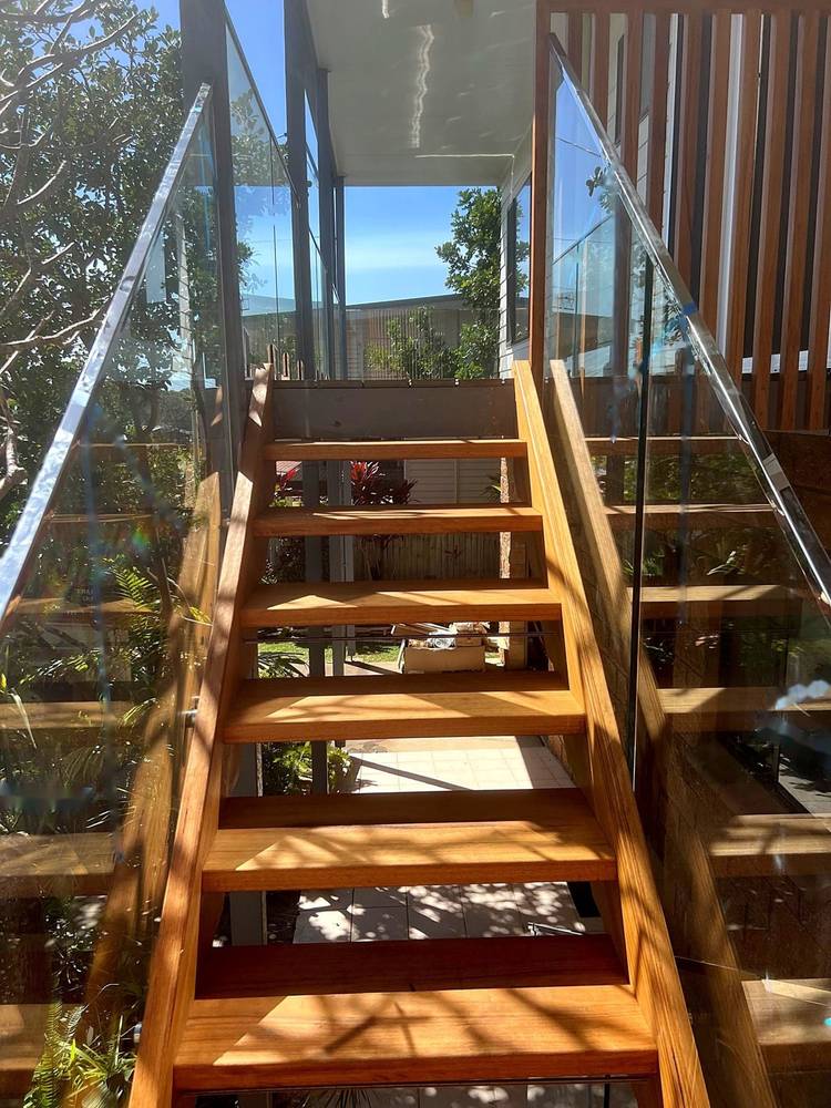 Spotted gum staircase and custom glass balustrade in Sandy Beach